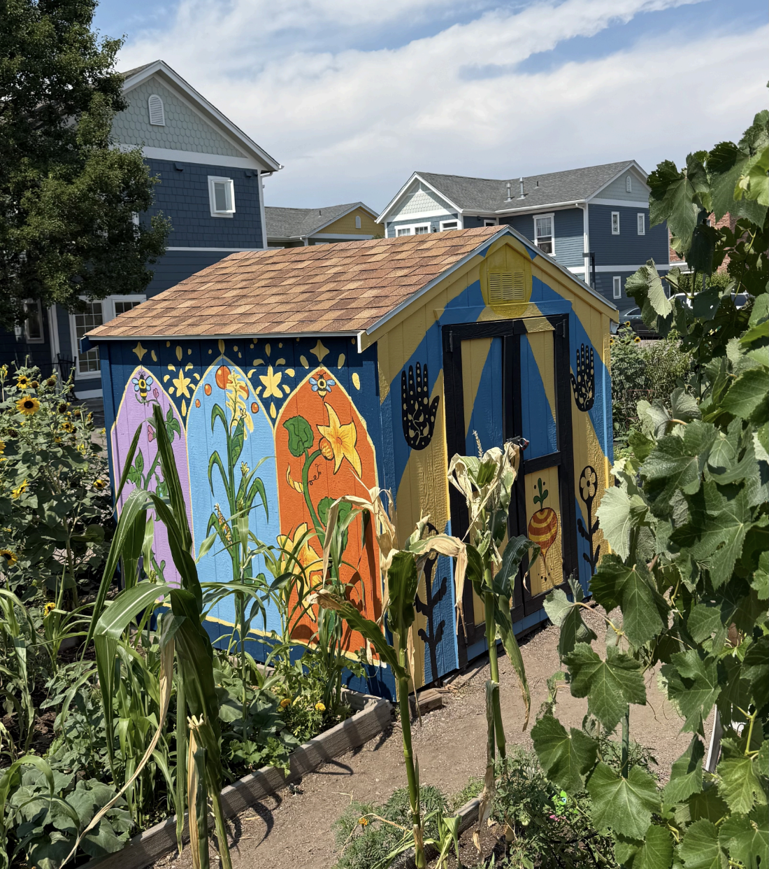 “Rooted Together” Mural Painted on Horsebarn Garden