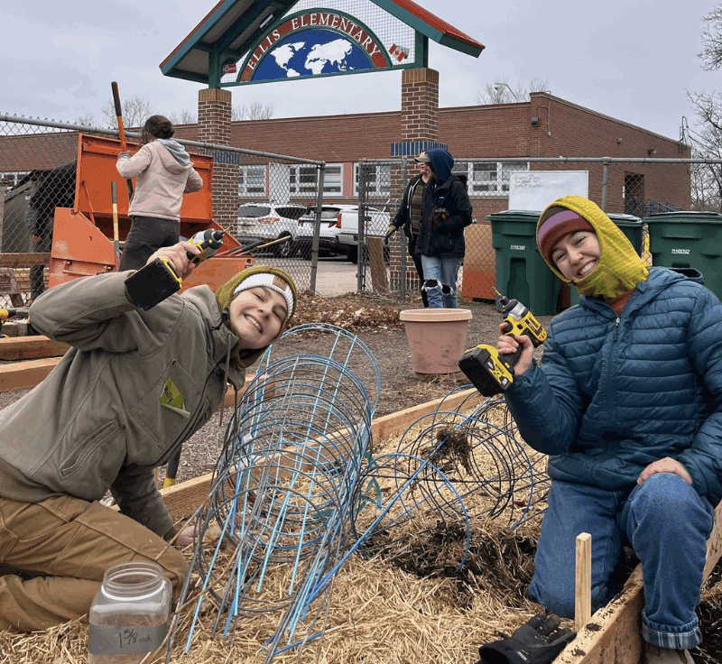 DUG Corps holding power tools