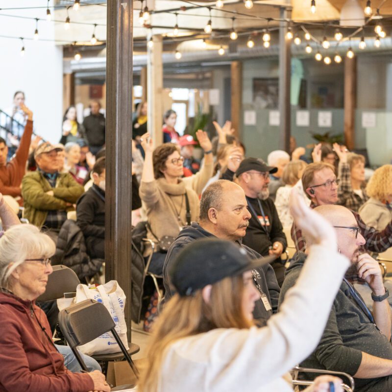 Garden Leaders raising their hands during symposium event