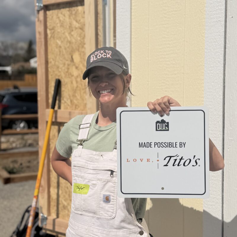 taylor holding up tito's sign 2026