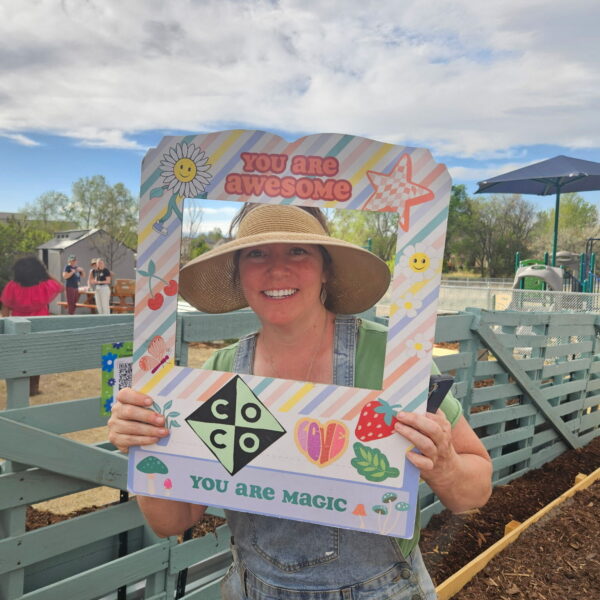 person holding Compost Colorado Sign